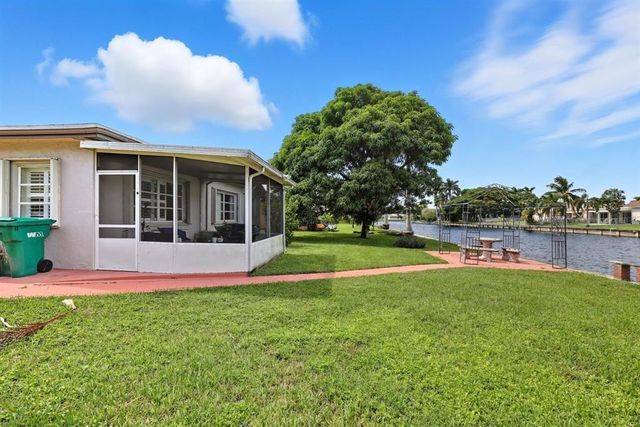 9407 NW 70th Place, Tamarac, FL 33321