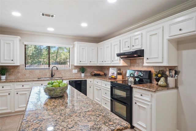 7415 Revelwood Drive, Magnolia, TX 77354