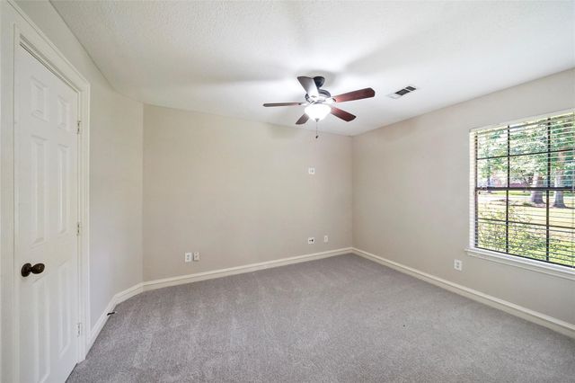 7415 Revelwood Drive, Magnolia, TX 77354