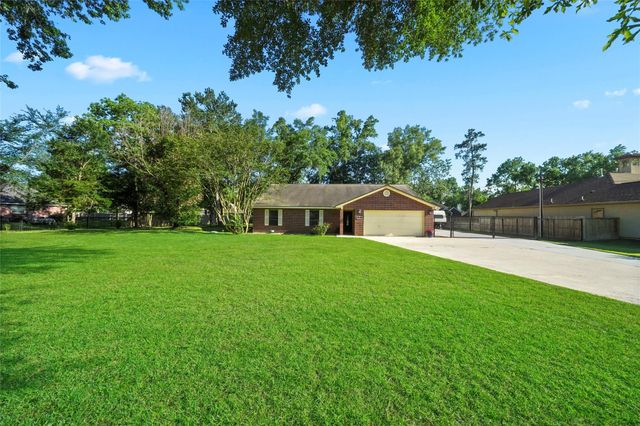 7415 Revelwood Drive, Magnolia, TX 77354