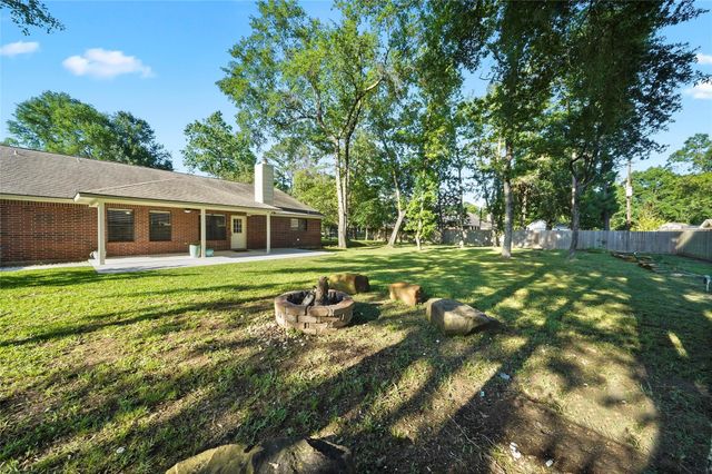 7415 Revelwood Drive, Magnolia, TX 77354