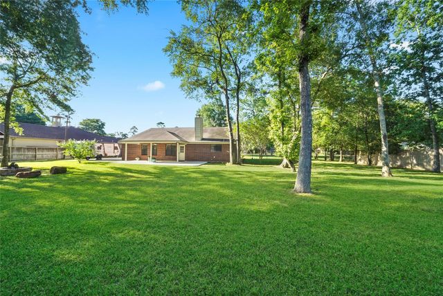 7415 Revelwood Drive, Magnolia, TX 77354