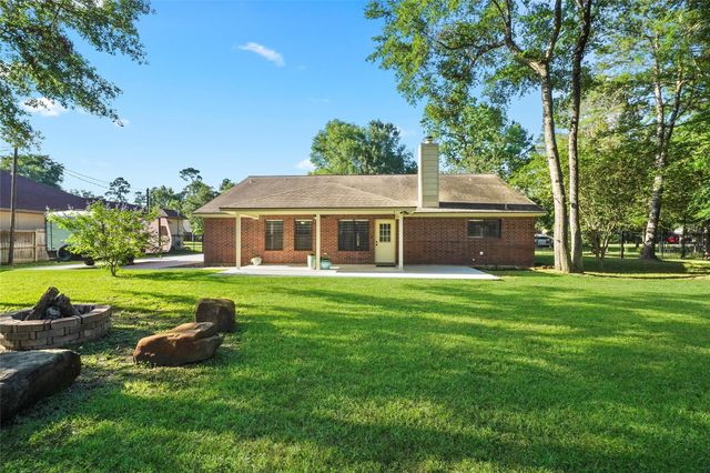 7415 Revelwood Drive, Magnolia, TX 77354