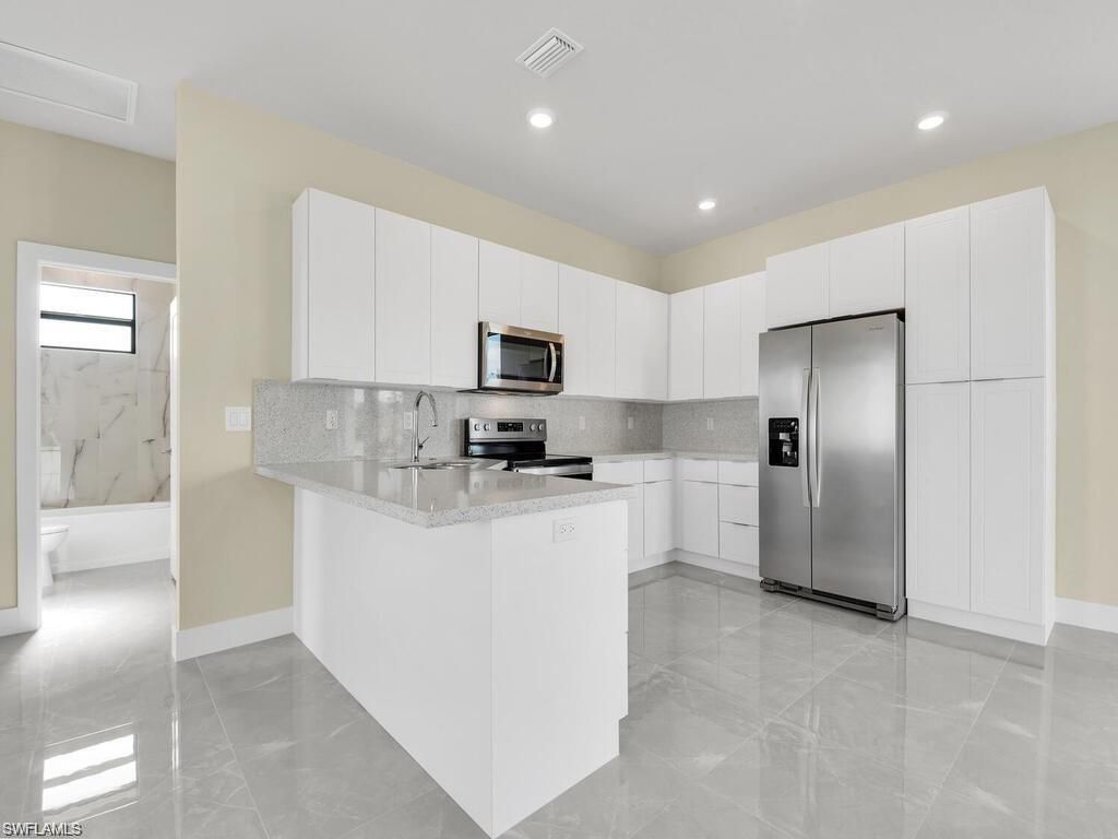 Image 4 of property listing at 800 NW 3rd AVE, Cape Coral, FL 33993