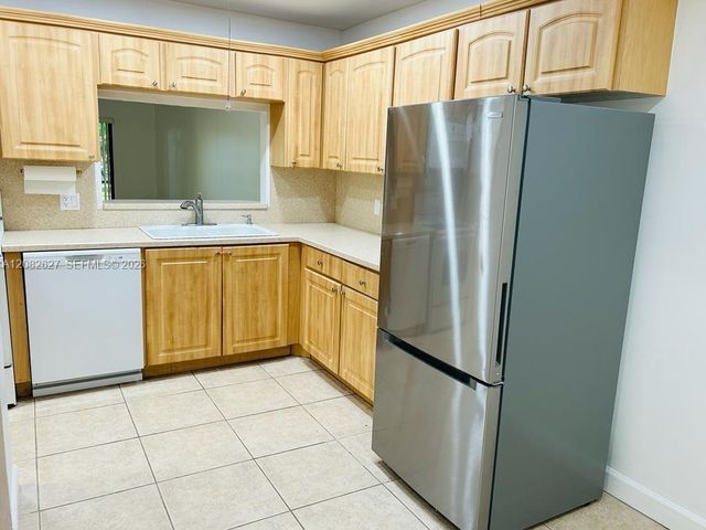 611 Racquet Club Road 1, Weston, FL 33326