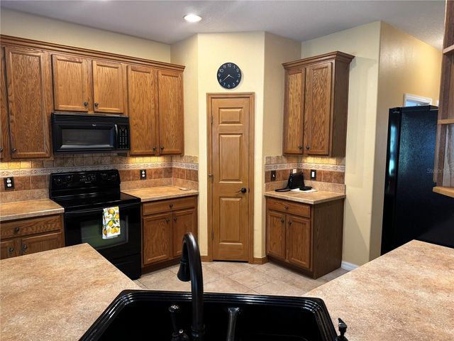 100 VIZCAYA COURT, Poinciana, FL 34759