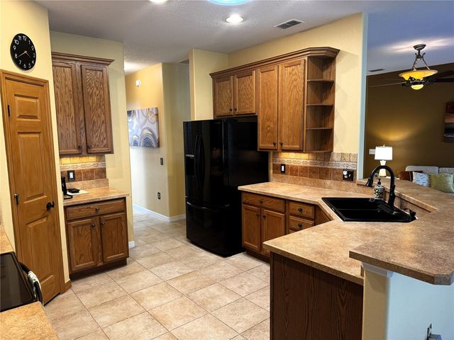 100 VIZCAYA COURT, Poinciana, FL 34759