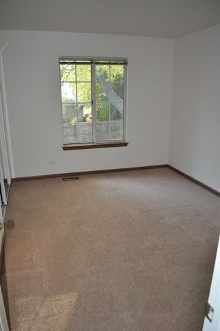 15 Whispering Drive, Streamwood, IL 60107