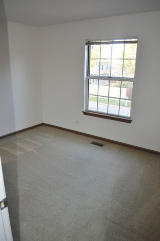 15 Whispering Drive, Streamwood, IL 60107