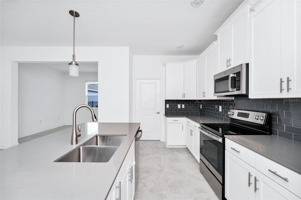 Image 8 of property listing at 9971 INTRODUCTION WAY, Orlando, FL 32832