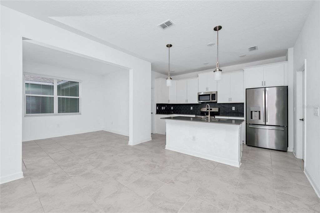 Image 9 of property listing at 9971 INTRODUCTION WAY, Orlando, FL 32832