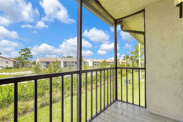 7142 Golf Colony Court 206, Lake Worth, FL 33467