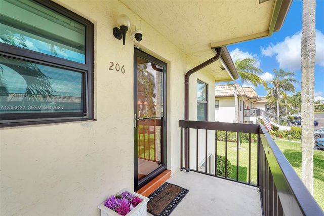 7142 Golf Colony Court 206, Lake Worth, FL 33467