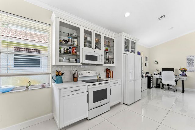 104 Hidden Hollow, Palm Beach Gardens, FL 33418