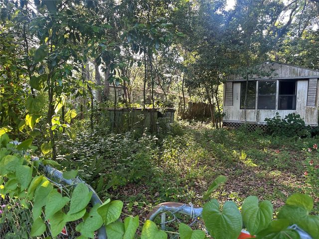 1128 N JACKSON AVENUE S, Spring Hill, FL 34604
