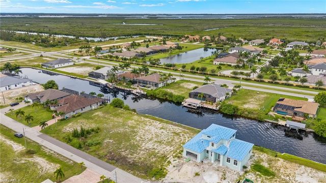 908 NW 39th AVE, Cape Coral, FL 33993