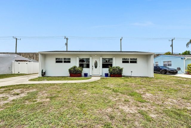 9446 Birmingham Drive, Palm Beach Gardens, FL 33410