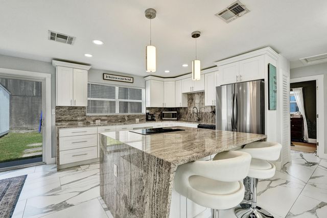 9446 Birmingham Drive, Palm Beach Gardens, FL 33410