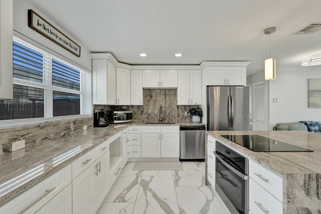 9446 Birmingham Drive, Palm Beach Gardens, FL 33410