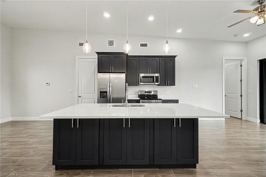3013 4th ST SW, LEHIGH ACRES, FL 33976 — photo 5