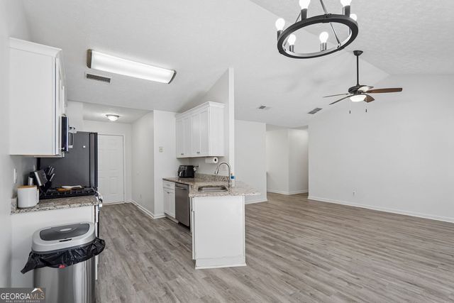1077 Woodsong Pass Court, Lawrenceville, GA 30043