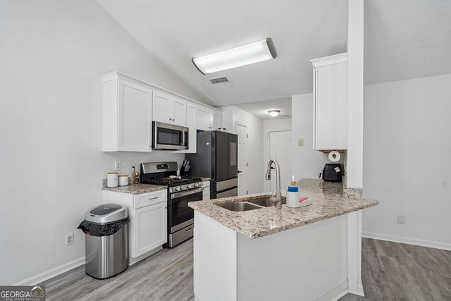 1077 Woodsong Pass Court, Lawrenceville, GA 30043