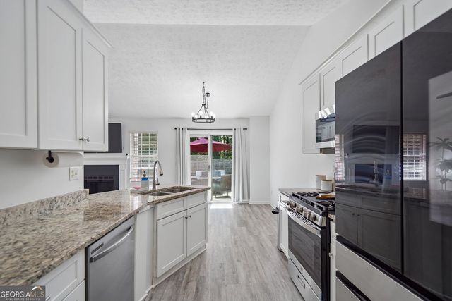 1077 Woodsong Pass Court, Lawrenceville, GA 30043