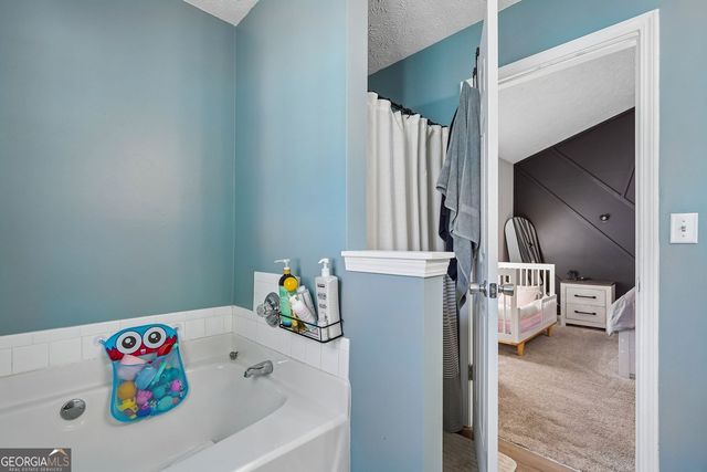 1077 Woodsong Pass Court, Lawrenceville, GA 30043