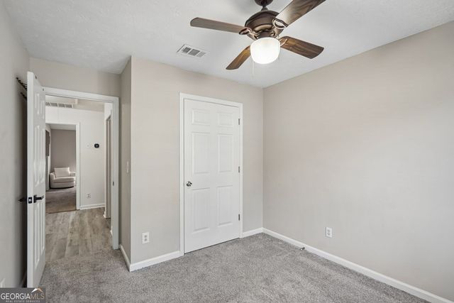 1077 Woodsong Pass Court, Lawrenceville, GA 30043