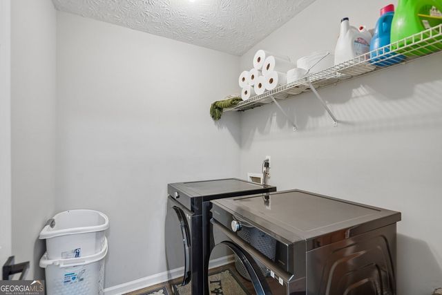 1077 Woodsong Pass Court, Lawrenceville, GA 30043