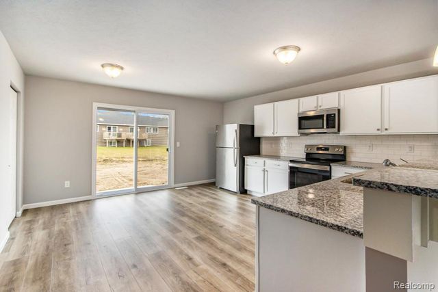 3157 Wild Orchid Lane, Burton, MI 48519