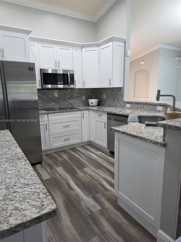 1816 Tomaso Avenue, Lehigh Acres, FL 33972