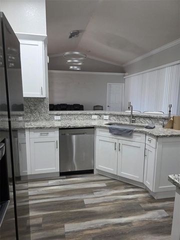 1816 Tomaso Avenue, Lehigh Acres, FL 33972