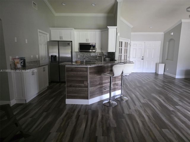 1816 Tomaso Avenue, Lehigh Acres, FL 33972