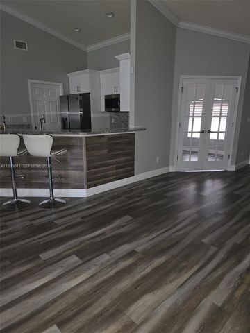1816 Tomaso Avenue, Lehigh Acres, FL 33972