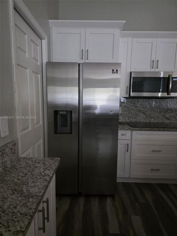 1816 Tomaso Avenue, Lehigh Acres, FL 33972