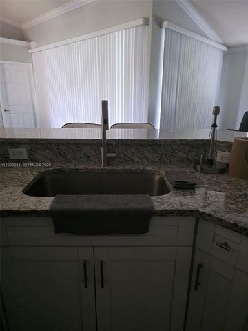 1816 Tomaso Avenue, Lehigh Acres, FL 33972