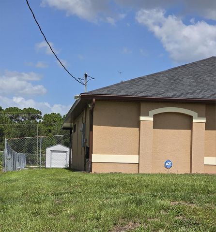 1816 Tomaso Avenue, Lehigh Acres, FL 33972