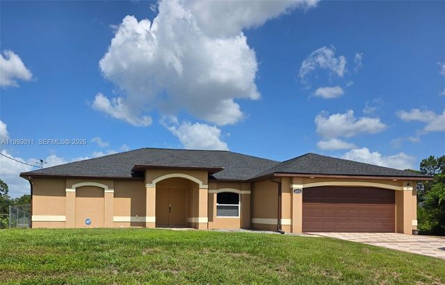 1816 Tomaso Avenue, Lehigh Acres, FL 33972