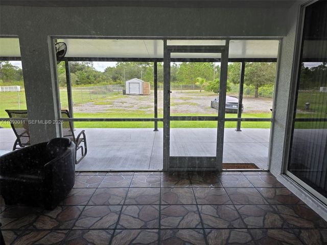1816 Tomaso Avenue, Lehigh Acres, FL 33972