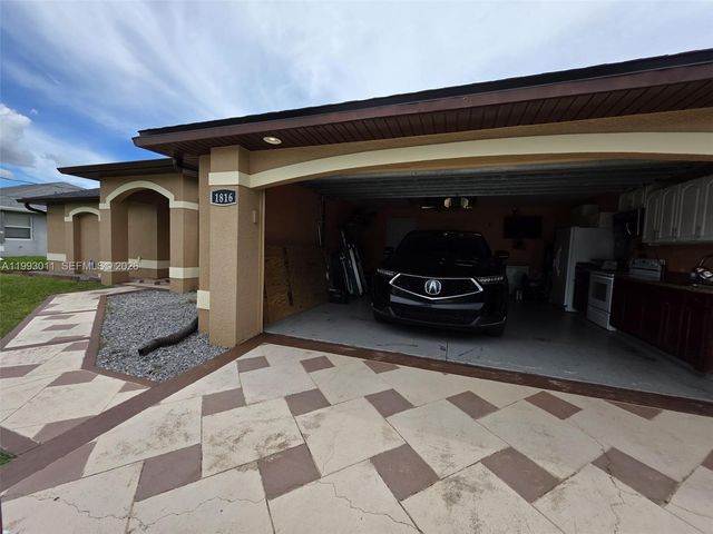 1816 Tomaso Avenue, Lehigh Acres, FL 33972
