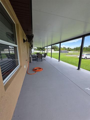1816 Tomaso Avenue, Lehigh Acres, FL 33972
