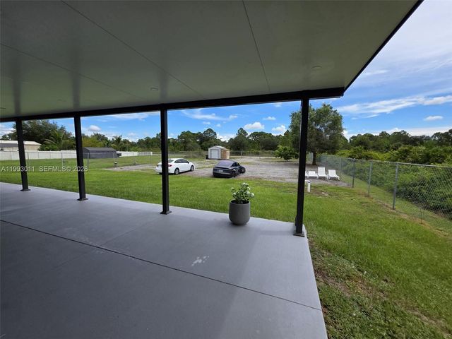 1816 Tomaso Avenue, Lehigh Acres, FL 33972