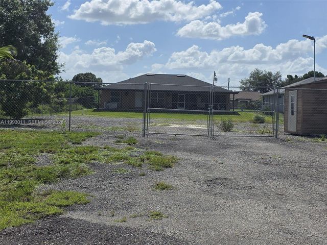 1816 Tomaso Avenue, Lehigh Acres, FL 33972