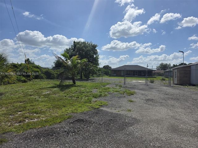 1816 Tomaso Avenue, Lehigh Acres, FL 33972