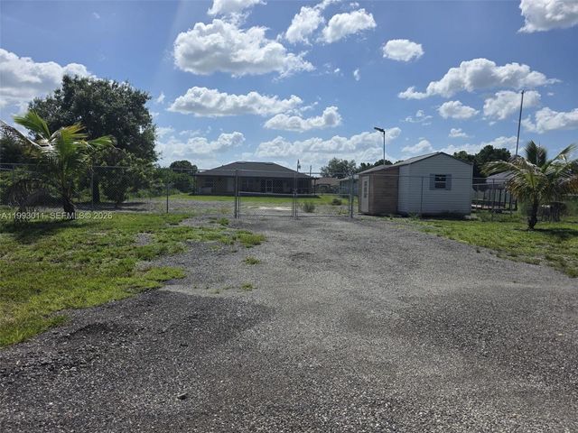 1816 Tomaso Avenue, Lehigh Acres, FL 33972