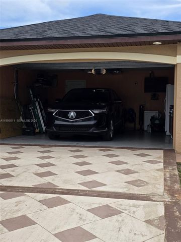 1816 Tomaso Avenue, Lehigh Acres, FL 33972