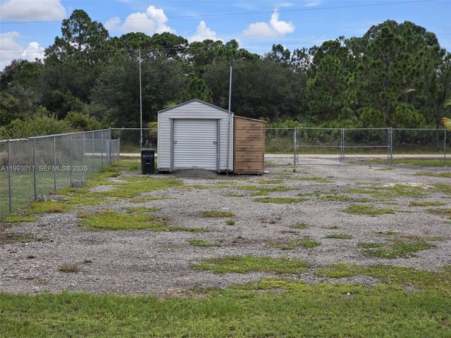1816 Tomaso Avenue, Lehigh Acres, FL 33972