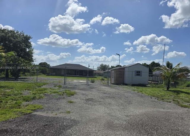 1816 Tomaso Avenue, Lehigh Acres, FL 33972