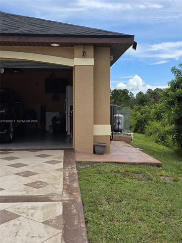 1816 Tomaso Avenue, Lehigh Acres, FL 33972
